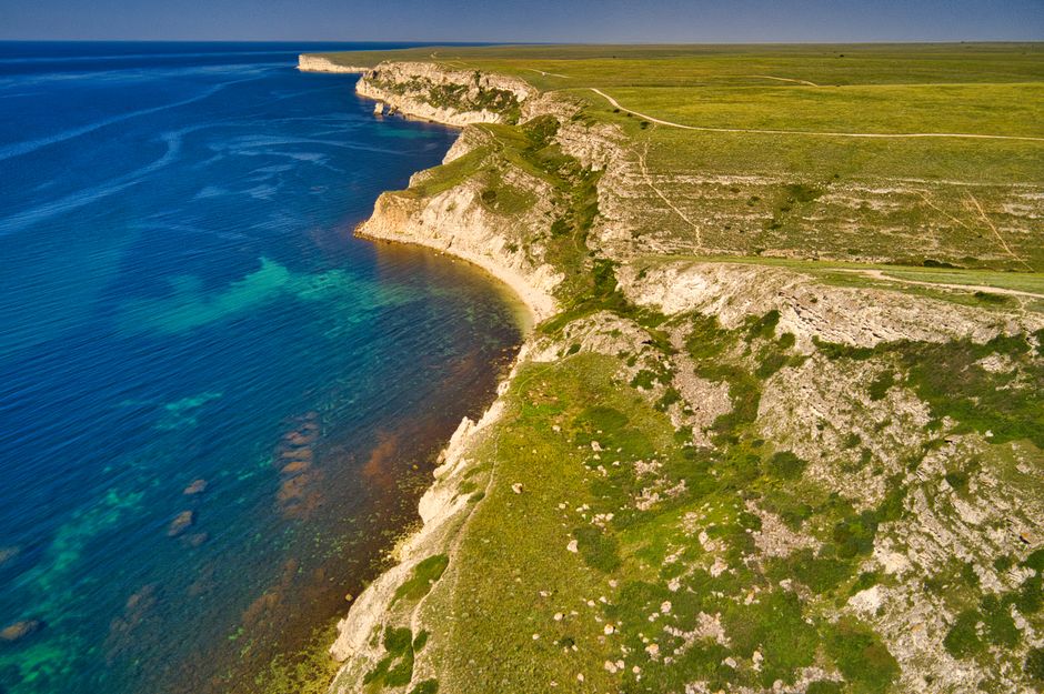 Ukrainian Drones Strike Russian Oil Depots, Crimea Power Grid Amid Escalation